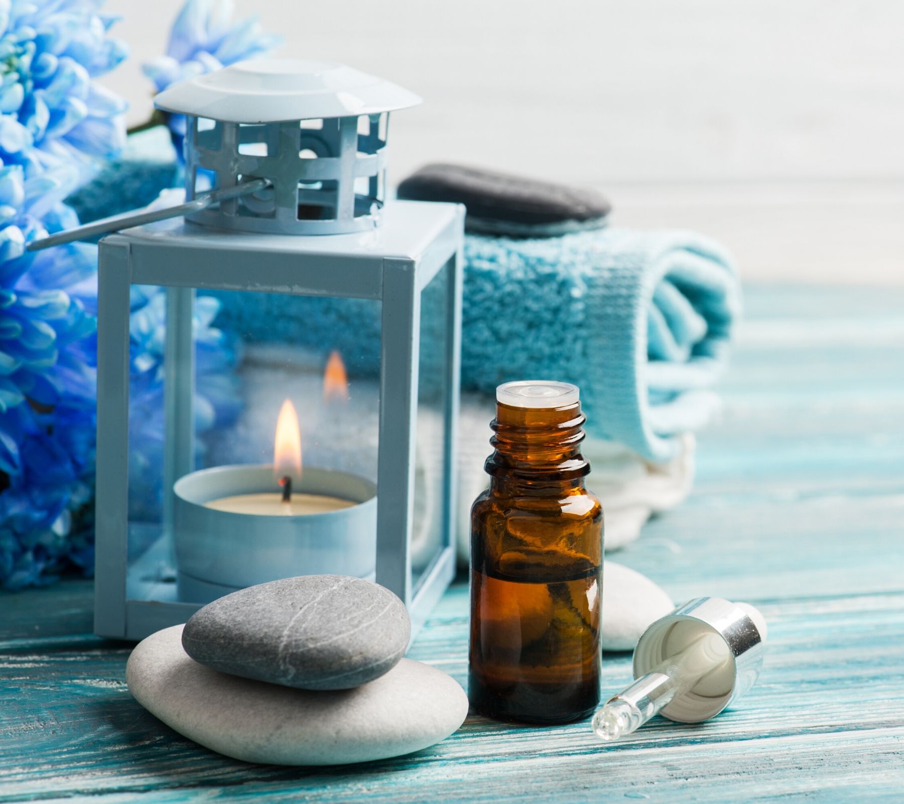 Essential oil bottle on table.