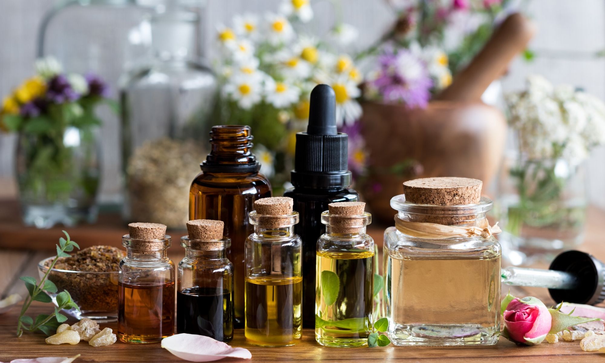 Essential oil bottles on table.