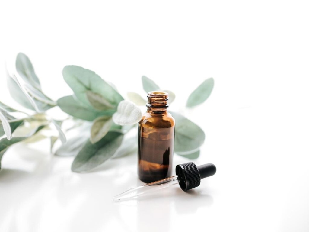 sage essential oils with high frequency on table 