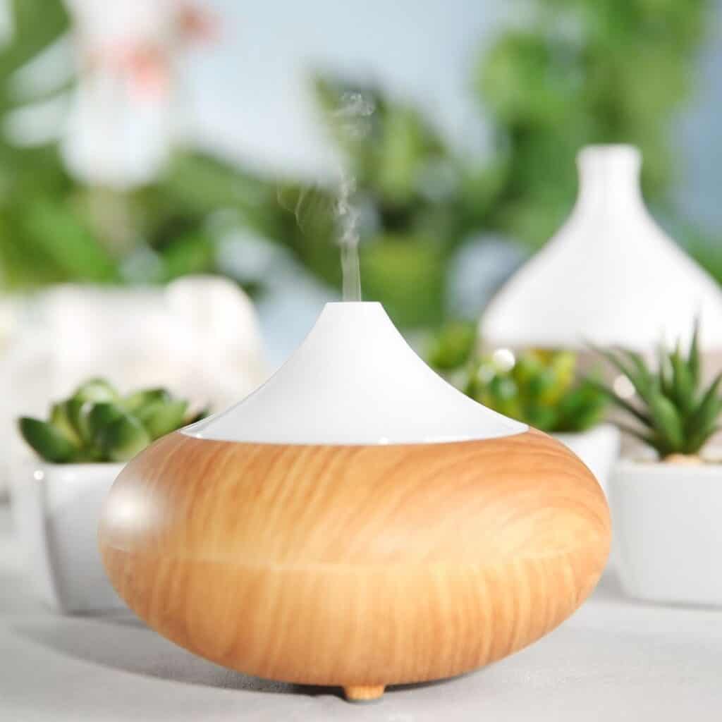 essential oil diffusers on table diffusing