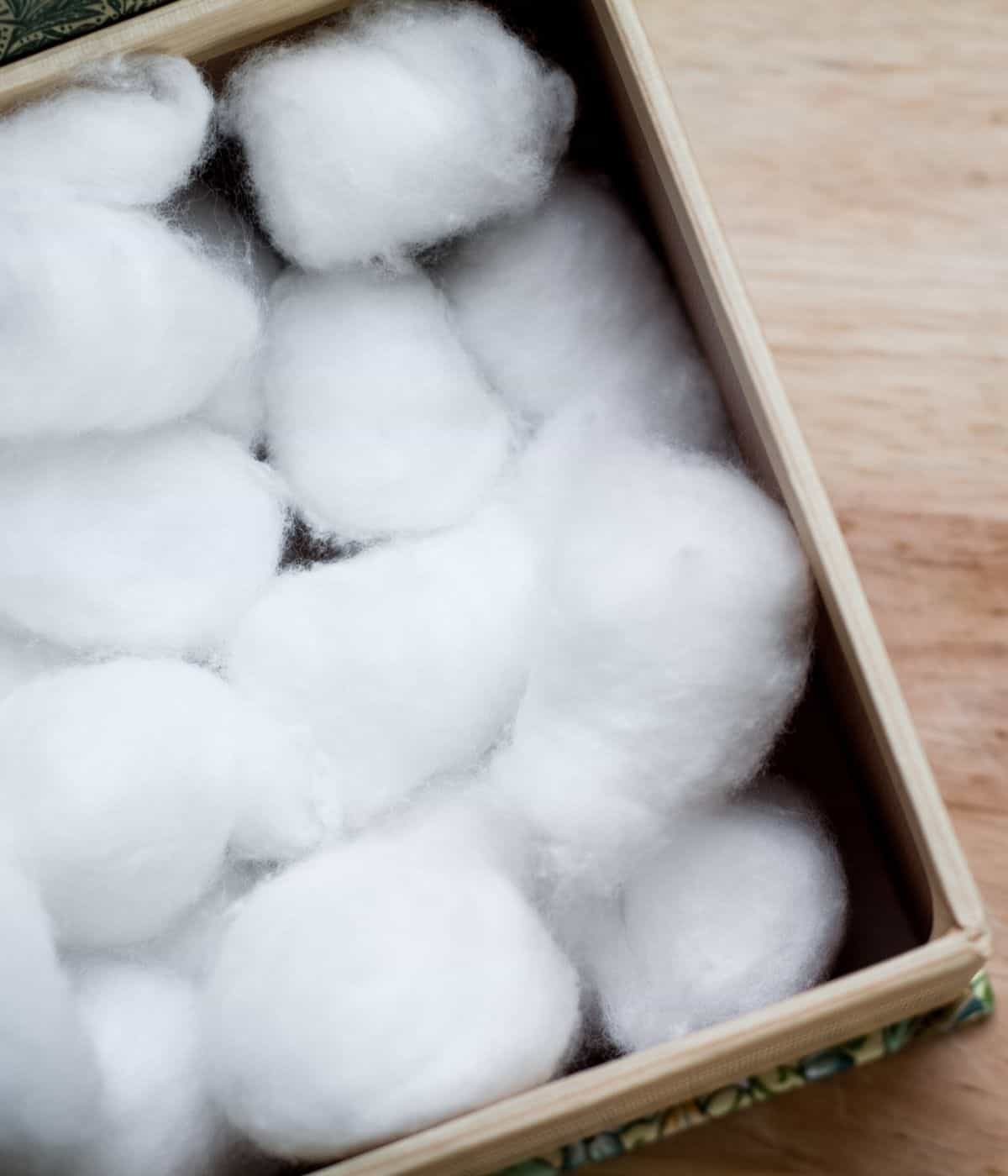 Cotton balls in container ready to diffuse.