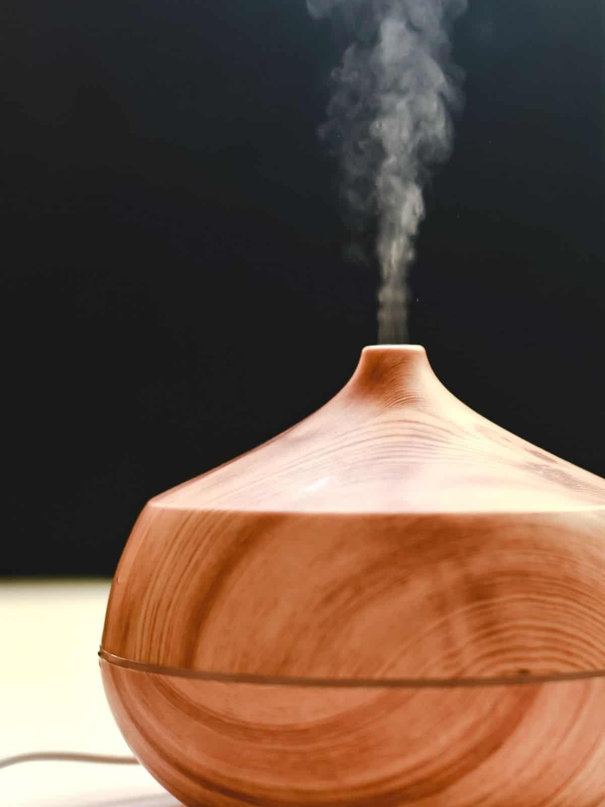Faux wooden diffuser on a table.