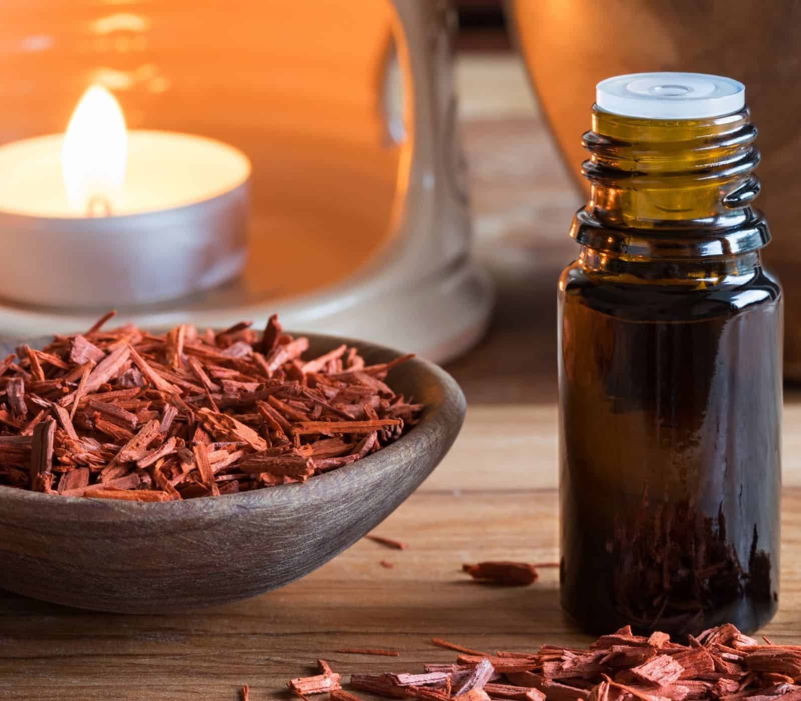 Sandalwood essential oil on table.