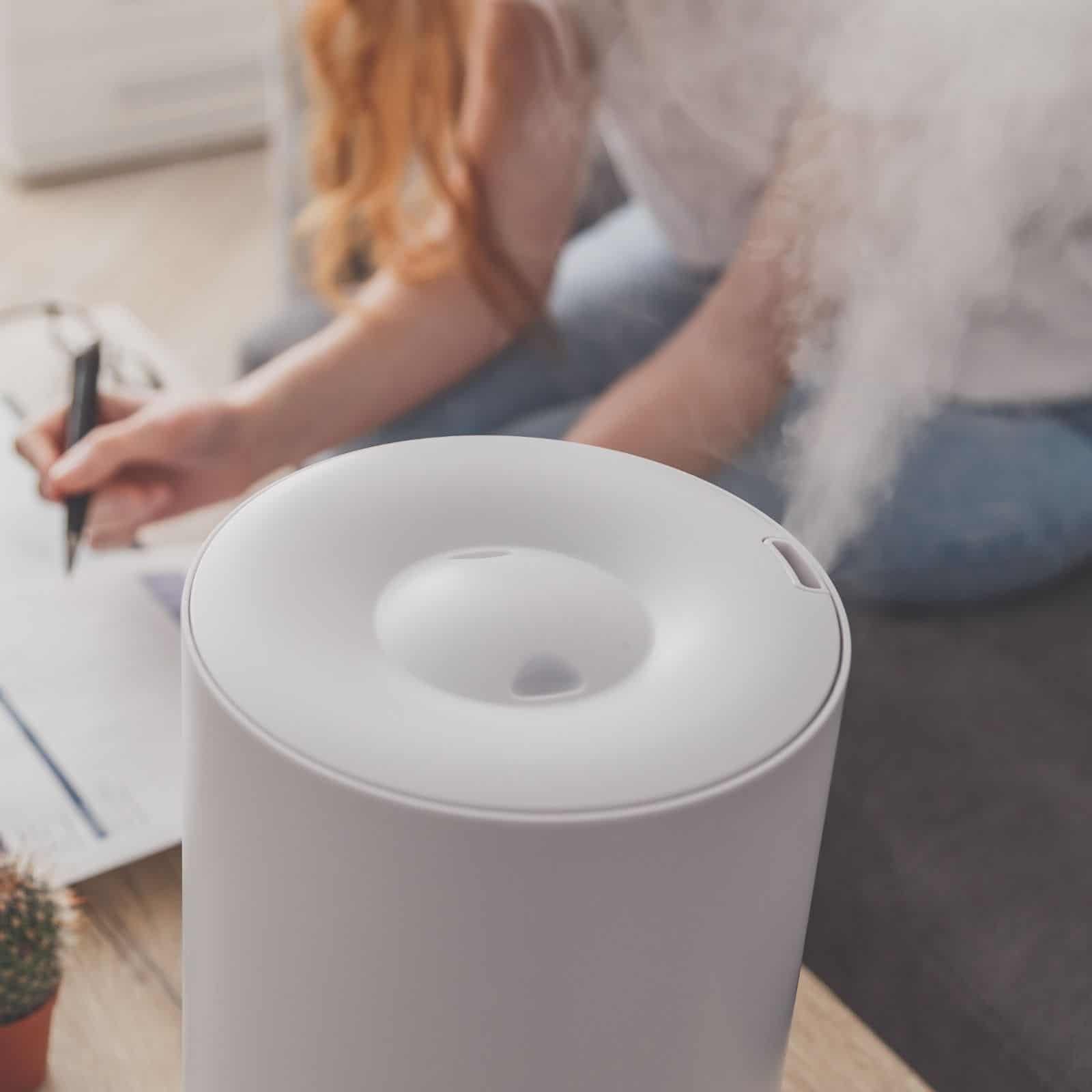 Humidifier on table in room.