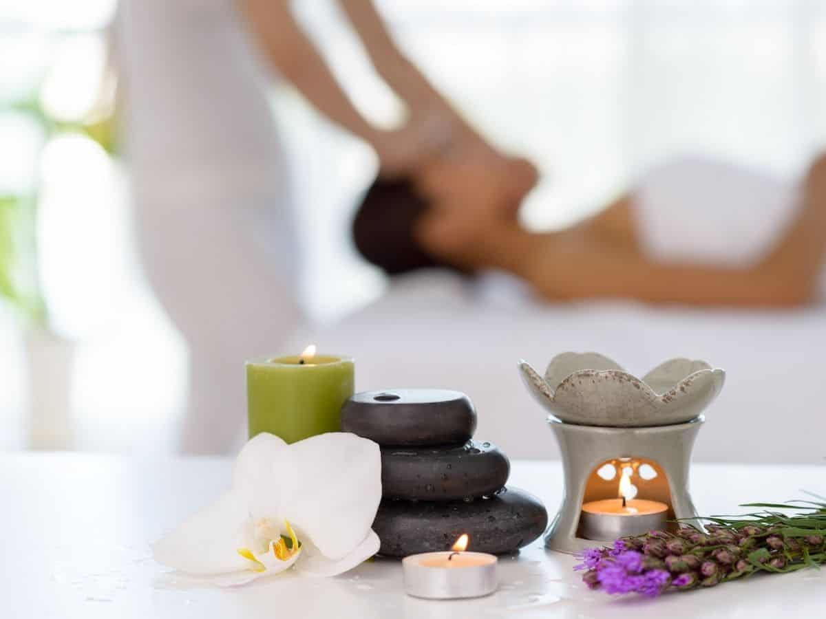 Woman getting a massage at a spa.