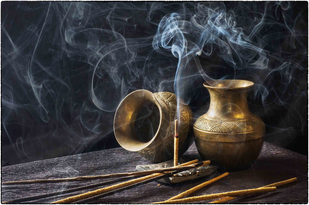 Burning incense in a pot.