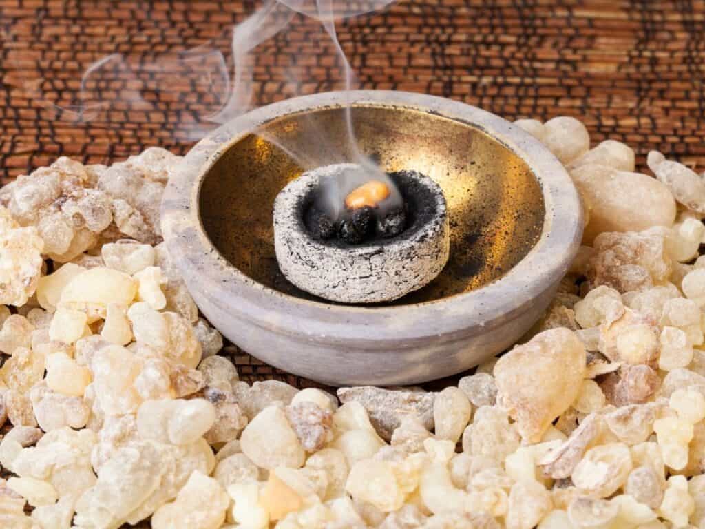 Frankincense incense burning in bowl.