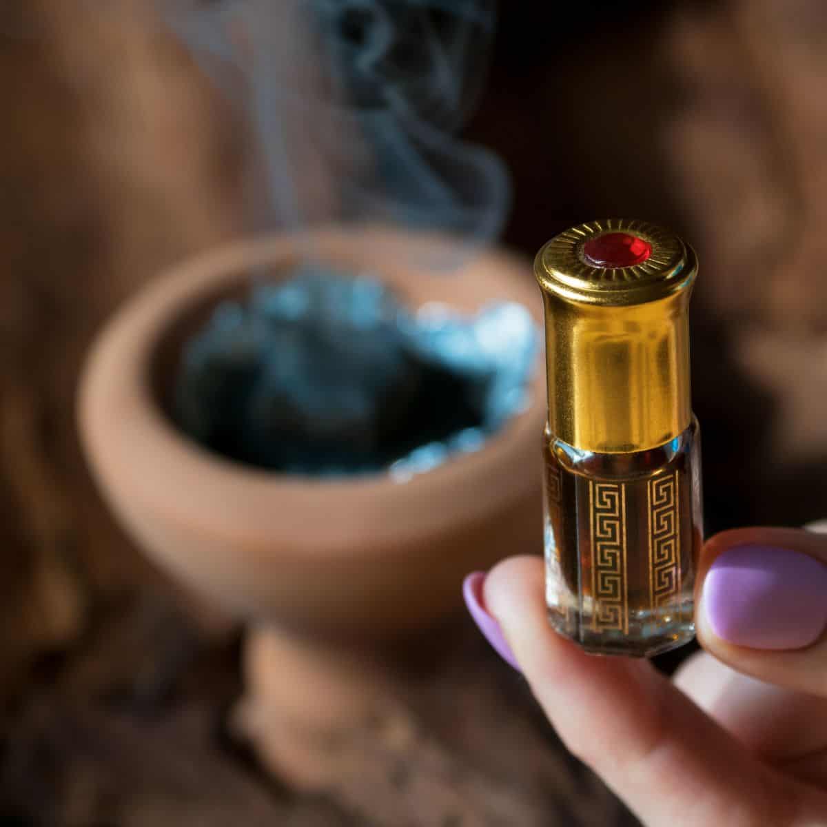 Patchouli incense on table with oil.